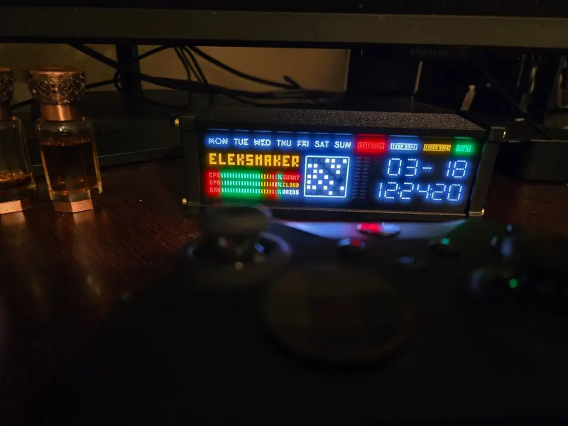 The desk’s retro heartbeat — pixels telling time.