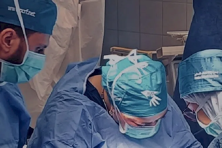 Surgeons from a PCRF medical mission at work in an operating room